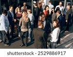 Diverse people mingle in business social event outdoors. Diverse group of people socializing outdoors. Men and women in conversation. Casual business gathering, lively interaction, diverse crowd.