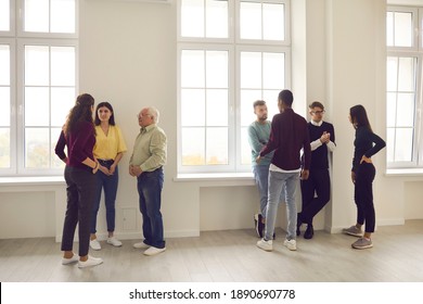Diverse people mingling in community meeting or group therapy, talking about common interests, getting to know each other, communicating ideas, discussing problems and looking for solutions together