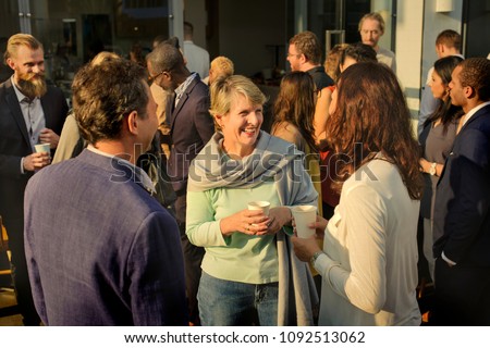 Diverse people mingling at an event