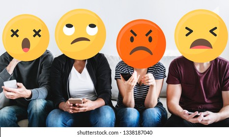 Diverse People With Negative Emoticons Using Mobile Phones