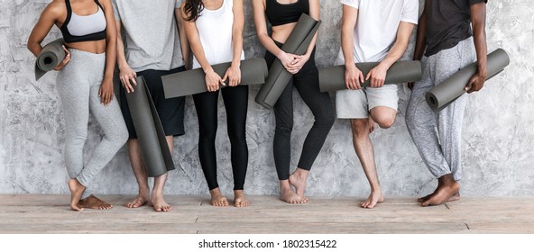 Diverse People In Sportswear With Yoga Mats In Hands Posing Near Wall, Cropped Image With Free Space, Panorama