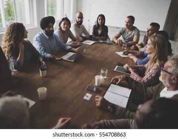 Diverse People Teamwork On Meeting Table