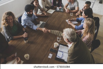 Diverse people teamwork on meeting table