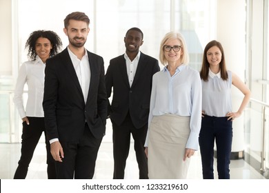 Diverse Professional Business Team People Portrait, Smiling Multiracial Employees, Company Staff Members, Corporate Workers Group And Leaders Executives Standing In Modern Office Looking At Camera