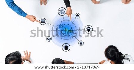 Diverse professionals collaborate over a table, pointing at a digital representation of artificial intelligence, symbolizing innovation, teamwork, and technology integration. Trope