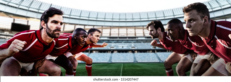 Diverse rugby players on field against rugby stadium at dawn - Powered by Shutterstock