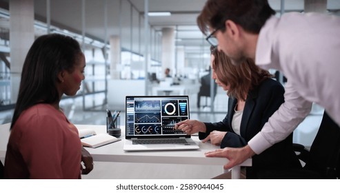 Diverse Team Analyzing Customer Data On Virtual Analytics Dashboard  Financial Analysts Collaborating On Predictive Analytics