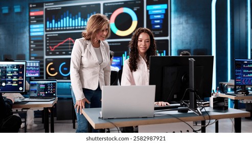Diverse Team of Data Analysts Utilizing KPI Dashboard in Office