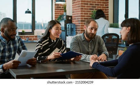 Diverse Team Of HR Workers Interviewing Candidate For Job Offer, Attending Employment And Recruitment Meeting In Office. Business People Talking To Jobless Woman About Career Opportunity.