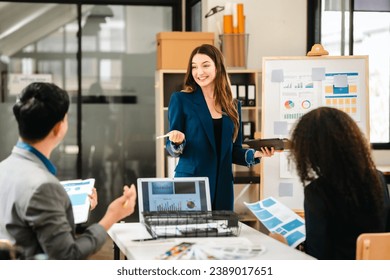 diverse team of professionals engaged in a website graphic design board meeting, sharing opinions on UX and UI design elements. Asian man, African American people, black, afro, caucasian female - Powered by Shutterstock - Get 15% off with code: PIKWIZARD15