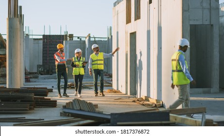 Diverse Team of Specialists Taking a Walk Through Construction Site. Real Estate Building Project with Senior Civil Engineer, Architect, General Worker Discussing Planning and Development Details. - Shutterstock ID 1817376872