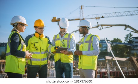 Diverse Team of Specialists Use Tablet Computer on Construction Site. Real Estate Building Project with Civil Engineer, Architect, Business Investor and General Worker Discussing Plan Details.