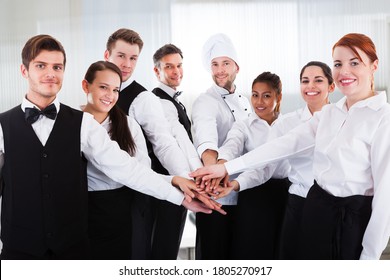 Diverse Team Of Waiters And Hospitality Staff People In Uniform