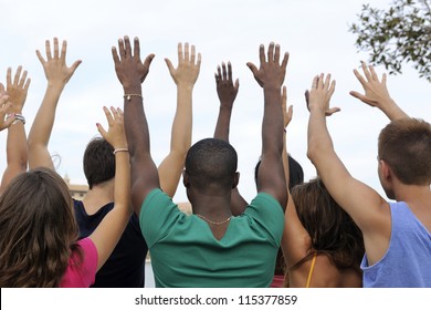 Diverse Volunteer Group Raising Hands