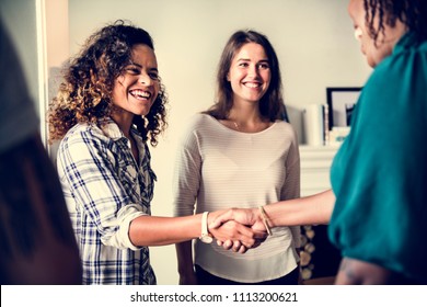 Diverse Woman Shaking Hands