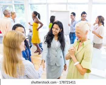 Diverse Women Discussing At Community Center