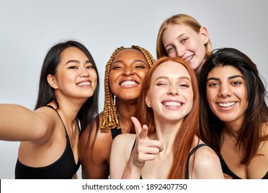 diverse women taking selfie, looking at camera and smiling, having unique natural beauty, prefect toothy smile, isolated white background