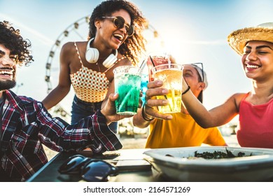 Diverse Young People Celebrating Cheering Cocktail Glasses Outside - Happy Group Of Friends Having Fun Together On Summer Vacation - Friendship Concept With Guys And Girls Enjoying Weekend Event 