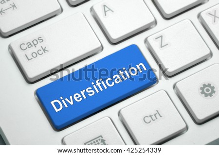 Diversification text written on Blue button White Keyboard