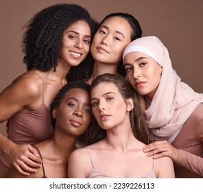 Diversity, beauty and portrait of a group of women in studio for skincare, makeup or cosmetic routine. Feminism, female empowerment and face of multicultural girl friends isolated by brown background - Powered by Shutterstock