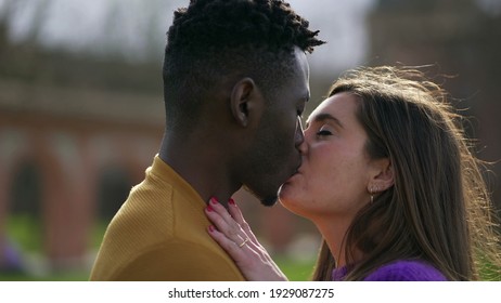 Diversity Concept. Black Man Kissing White Girlfriend. Millennial Modern Generation