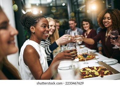 Diversity, dinner and group of people toast celebration together at party. Friends, happy and celebrate with food, wine and friendship for love, support and cheers champagne at business function