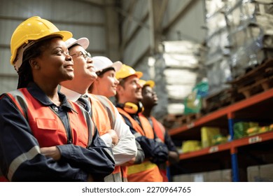 Diversity of engineer warehouse holding arms cross and standing in row on warehouse store at co-working, banner cover design. - Powered by Shutterstock