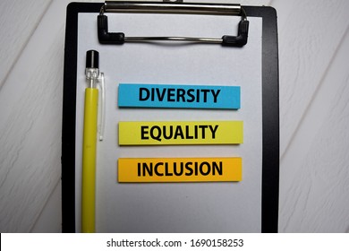 Diversity Equality Inclusion Write On A Sticky Note Isolated On Office Desk.