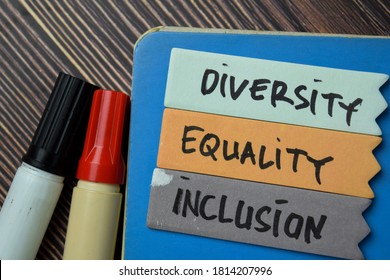 Diversity Equality Inclusion Write On A Sticky Note Isolated On Office Desk.