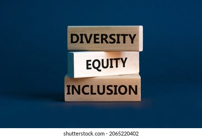 Diversity equity inclusion symbol. Concept words 'Diversity equity inclusion' on wooden blocks on beautiful grey background. Diversity, business, inclusion and equity concept. - Shutterstock ID 2065220402