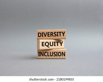 Diversity Equity Inclusion Symbol. Concept Words Diversity Equity Inclusion On Wooden Blocks. Beautiful Grey Background. Business And Diversity Equity Inclusion Concept. Copy Space.