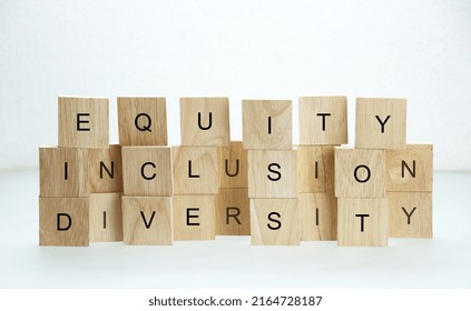 Diversity, Equity, Inclusion Words On Wooden Blocks Background DEI Concept