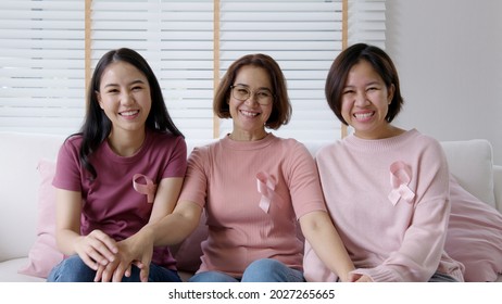Diversity group asia happy people or senior mature lady and teen girl sit at home sofa smile look at camera to help fight prevent or protect female disease issue relief, patient health care benefit. - Shutterstock ID 2027265665