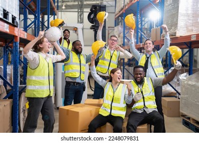 Diversity group of labor union in warehouse celebrate success after won protest salary increment - Powered by Shutterstock