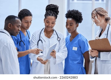 Diversity, healthcare and staff with tablet, talking and planning for procedure, teamwork and in hospital. Medical professional, team and group with device, conversation and telehealth for surgery - Powered by Shutterstock