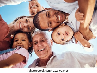 Diversity, huddle and family with smile, happy and bonding together for vacation, spend quality time and joyful. Interracial, grandparents or parents with kids being cheerful, happiness and low angle - Powered by Shutterstock