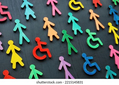 Diversity and inclusion concept. Colorful figurines on the dark surface. - Powered by Shutterstock