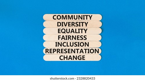 Diversity inclusion symbol. Concept words Community Diversity Equality Fairness Inclusion Representation Change on wooden stick on a beautiful blue background. Diversity equality inclusion concept.