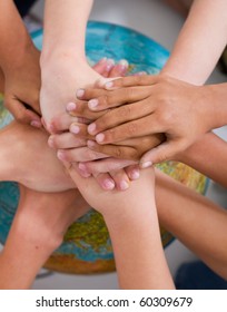 Diversity Kids Hands Together On Globe