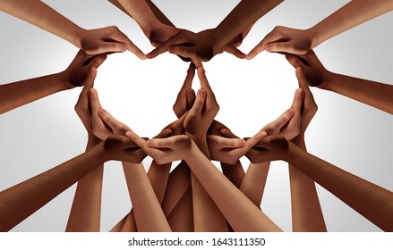 Diversity love and unity partnership as heart hands in groups of diverse people connected together shaped as an inclusion and inclusive support symbol of teamwork and togetherness.
