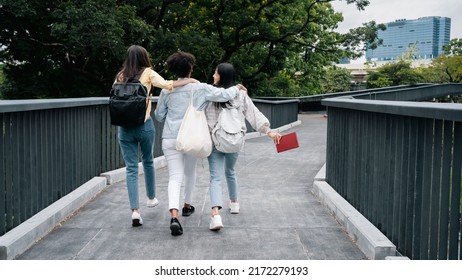 Diversity Multi Ethnic Woman Student Holding Books And Looking At Natural Outdoors At Park. Prepare For College And University Concept.Informal National Education .looking For Scholarship Opportunity.