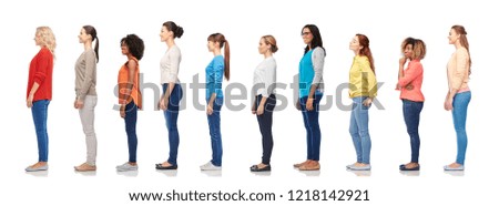 diversity and people concept - group of happy multiracial women standing in queue, isolated on white