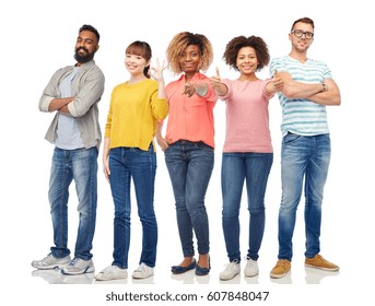 diversity, race, ethnicity and people concept - international group of happy smiling men and women over white background
