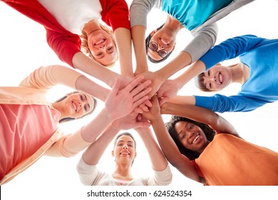 Diversity, Race, Ethnicity And People Concept - International Group Of Happy Smiling Different Women Over White Holding Hands Together