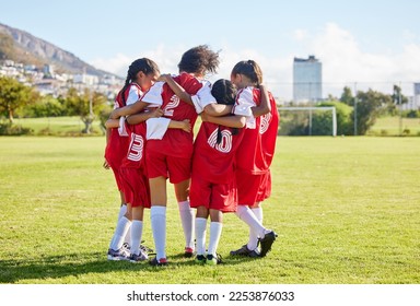 Diversity, sports girl hug and soccer field training for youth competition match playing at stadium grass. Team, young athlete or player enjoy football teamwork or support world cup championship - Powered by Shutterstock