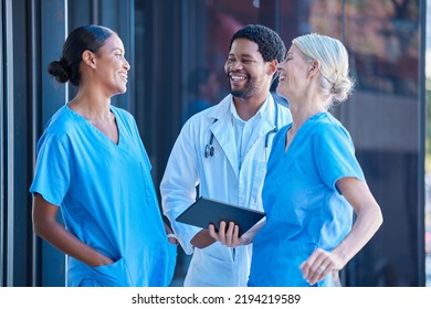 Diversity, teamwork and healthcare, a team of doctors talking and laughing outside a hospital. A happy black doctor and women nurses having a conversation. A group of medical employees during a