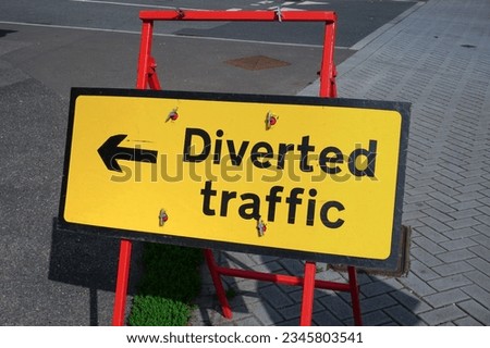 Diverted traffic road sign. warning sign for motorists at road works site.