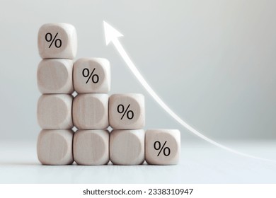 dividend concept,Increasing cube block stacking with up arrow and percentage sign for increase financial interest rate and business investment growth 