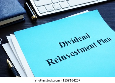 Dividend Reinvestment Plan - DRIP on the desk.
