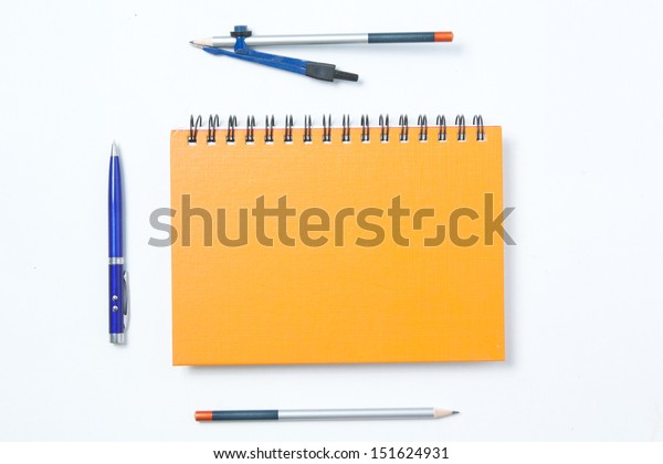 dividers, notebook, pen\
and pencil on white